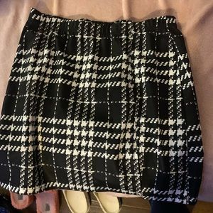 Woman plaid skirt